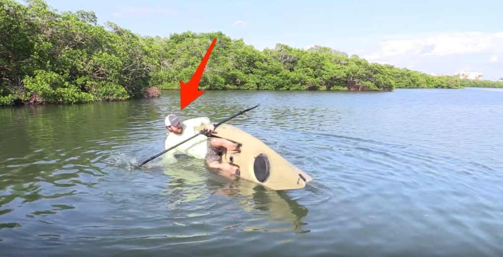 how to get back in your kayak after it flips over in deep