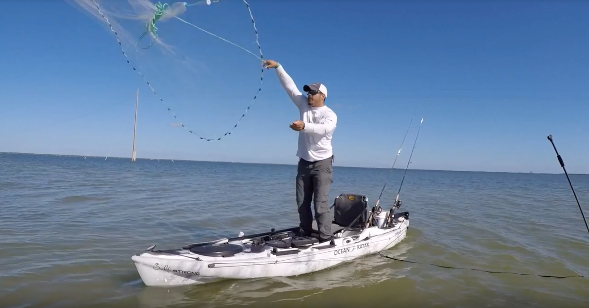 how to throw a cast net from a kayak