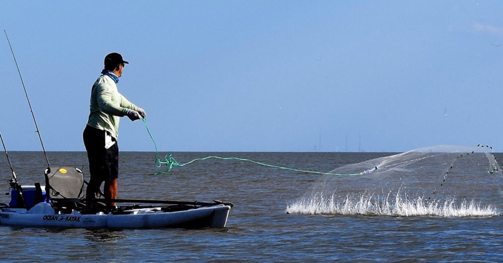 throwing cast net from kayak